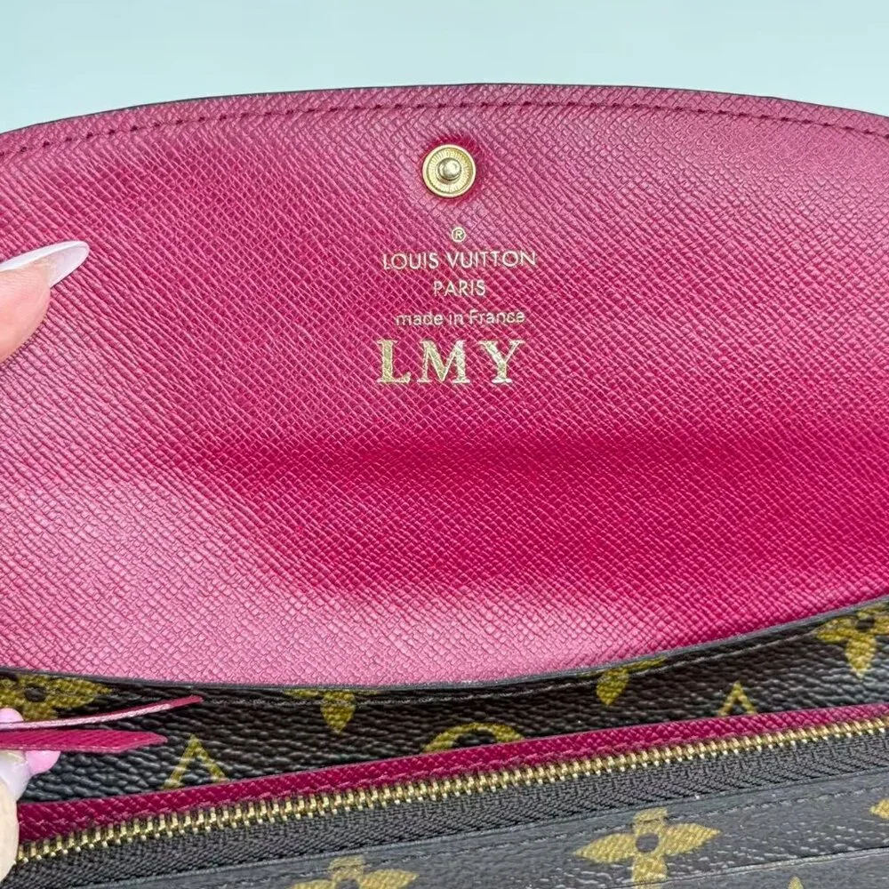 Louis Vuitton Monogram Canvas Wallet with Classic LV Pattern and Red Button
